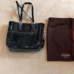 Navy blue patent coach purse like new.